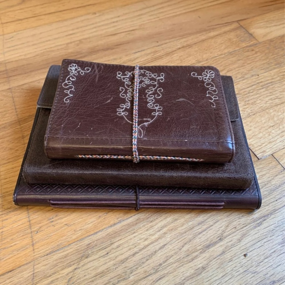 3 leather bound scarp/note books